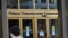 FILE - Signage is seen at the headquarters of the Federal Communications Commission in Washington, Aug. 29, 2020. A U.S. appeals court ruled on Dec. 31, 2024, that the FCC did not have the legal authority to reinstate landmark net neutrality rules.