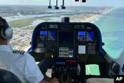 The cockpit of the Goodyear Blimp is scene during a flight, Wednesday, Feb. 12, 2025, in Daytona Beach, Fla.