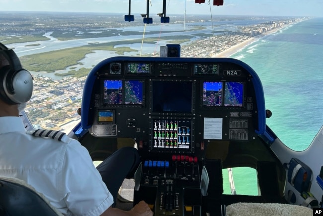 The cockpit of the Goodyear Blimp is scene during a flight, Wednesday, Feb. 12, 2025, in Daytona Beach, Fla. (AP Photo/Mark Long)