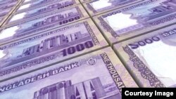 ছবিতে বাংলাদেশের ১০০০ টাকার নোট দেখা যাচ্ছে। ছবি সৌজন্য : অ্যাডোবে স্টক