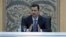 Syria's President Bashar al-Assad addresses new government, Damascus, June 26, 2012.
