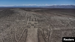 A drone view shows the ancient geoglyph of 'El Gigante de Tarapaca' placed on 'Unita' hill close to 'Huara' town area, in Atacama desert, Iquique, Chile, Oct. 28, 2024.