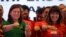 FILE - Davao City Mayor Sara Duterte-Carpio (L) and Ilocos Norte Governor Imee Marcos gestures during an alliance meeting with local political parties in Paranaque, Metro Manila in Philippines, Aug. 13, 2018. 