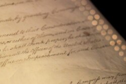 FILE - The word "Impeachment" as it is written in Article II of the U.S. Constitution, is seen on display in the Rotunda for the Charters of Freedom at the National Archives Museum in Washington.