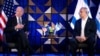 US President Joe Biden (L) speaks as Israel's Prime Minister Benjamin Netanyahu listens on prior to their meeting in Tel Aviv on October 18, 2023, amid the ongoing battles between Israel and the Palestinian group Hamas.