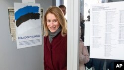 FILE - Chairwoman of the Reform Party Kaja Kallas arrives at a polling station during parliamentary elections in Tallinn, Estonia, March 3, 2019. 