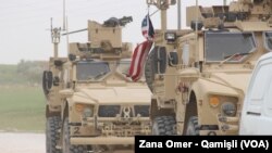 Abasirikare ba Reta zunze ubumwe z'Amerika mu gisagara ca Minbij, mu buraruko bwa Siriya.