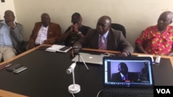 VaZvakanyorwa Wilbert Sadombo (vakasunga tayi), Va Wilfred Marimo (vane kepisi) nevamwe
