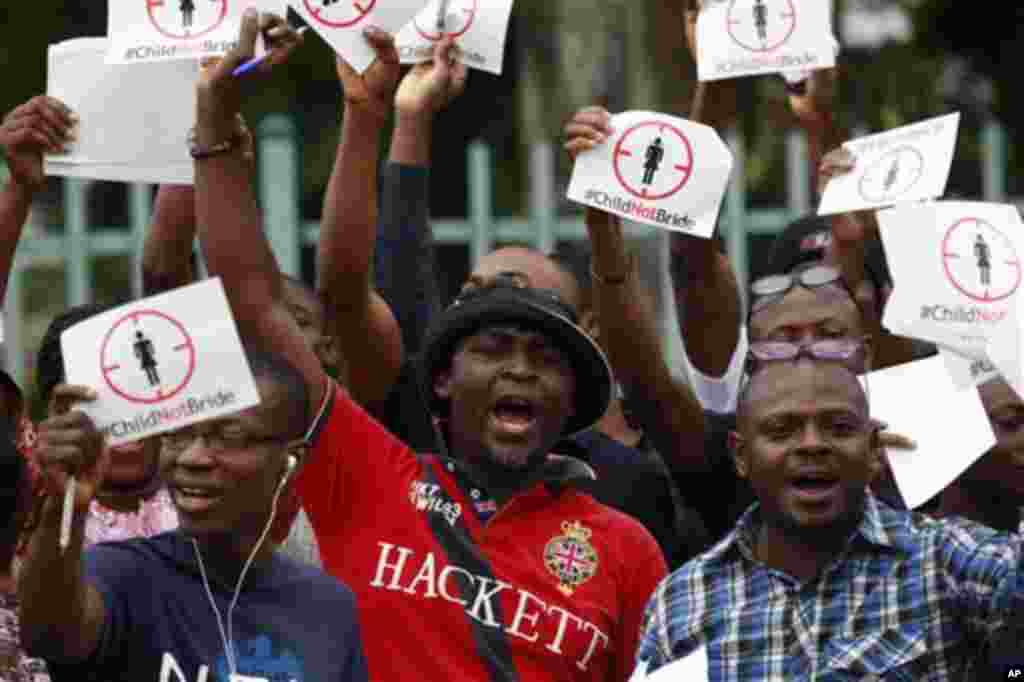 People protest against underage marriages in Lagos, July 20, 2013.