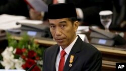 FILE - Indonesian President Joko "Jokowi" Widodo delivers his speech before Parliament members ahead of the country's Independence Day in Jakarta, Indonesia, Aug. 14, 2015.