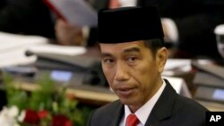 FILE - Indonesian President Joko "Jokowi" Widodo delivers his speech before Parliament members ahead of the country's Independence Day in Jakarta, Indonesia, Aug. 14, 2015.