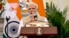 FILE - India's Prime Minister Narendra Modi gestures during a media briefing at Hyderabad House in New Delhi, Oct. 7, 2024.