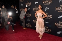 FILE - Ballet dancer Misty Copeland, a cast member in "The Nutcracker and the Four Realms," poses at the premiere of the film at the Dolby Theatre in Los Angeles, Oct. 29, 2018.