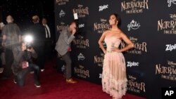 FILE - Ballet dancer Misty Copeland, a cast member in "The Nutcracker and the Four Realms," poses at the premiere of the film at the Dolby Theatre in Los Angeles, Oct. 29, 2018.