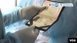 Kuhlolwa ipaspoti emngceleni kugqokwe ama gloves ngenxa yegcikwane le coronavirus