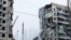 Aftermath of Dnipro apartment block destruction following missile strike
