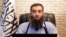 An image grab taken from a propaganda video uploaded on Sept. 9, 2013 by Syria's Islamic Front shows the new leader of Ahrar al-Sham group, Hashem al-Sheikh, known as Abu Jaber, speaking at an undisclosed location in Syria. 