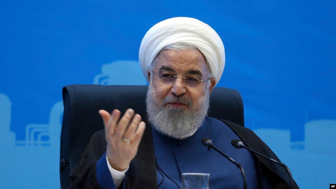FILE - Photo released by the official website of the office of the Iranian Presidency, shows President Hassan Rouhani speaking in a meeting during his provincial tour to the North Khorasan, Iran, July 14, 2019. 