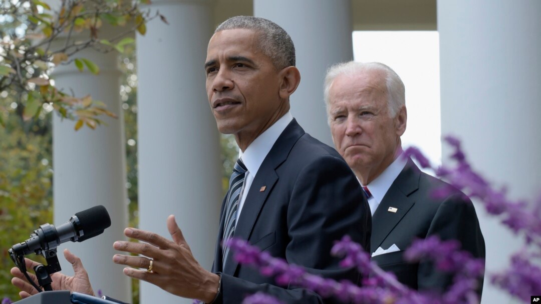 President Barack Obama, accompanied by Vice President Joe Biden, speaks about the election results in the Rose Garden at the White House in Washington, Nov. 9, 2016.