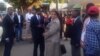 Attorney Lovemore Madhuku chatting with his client Thokozani Khupe outside the High Court in Bulawayo.