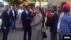 Attorney Lovemore Madhuku chatting with his client Thokozani Khupe outside the High Court in Bulawayo.