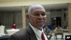 FILE FILE- FILE - In this May 5, 2017 file photo, then-incumbent head of Kenya's National Olympic Committee Kipchoge 'Kip' Keino, attends a meeting on the day committee elections were supposed to take place in Nairobi. 
