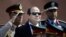 FILE - Egyptian President Abdel-Fattah el-Sissi, center, reviews honor guards, in Moscow, Russia, Aug. 26, 2015. 