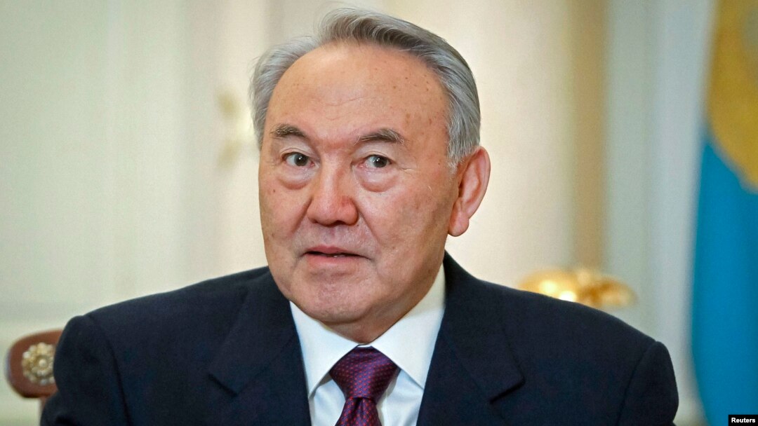 FILE - Kazakhstan's President Nursultan Nazarbayev attends a meeting at his office in Almaty, Feb. 25, 2013.
