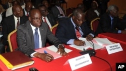 Central African Republic delegation awaits opening of peace talks with the Seleka rebel alliancein Libreville, Gabon, Jan. 9, 2013