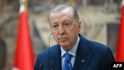 Serokomarê Tirkiyê Recep Tayyip Erdogan (Photo by Ozan KOSE / AFP)