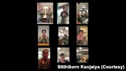 A snapshot of a clip of American-Thai military personnel clapping to support Thai medical staff.