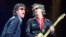 FILE - Mick Jagger, left, and Keith Richards perform "Jumping Jack Flash" during the Rolling Stones' No Security Tour performance at the Fleet Center in Boston on March 22, 1999. 
