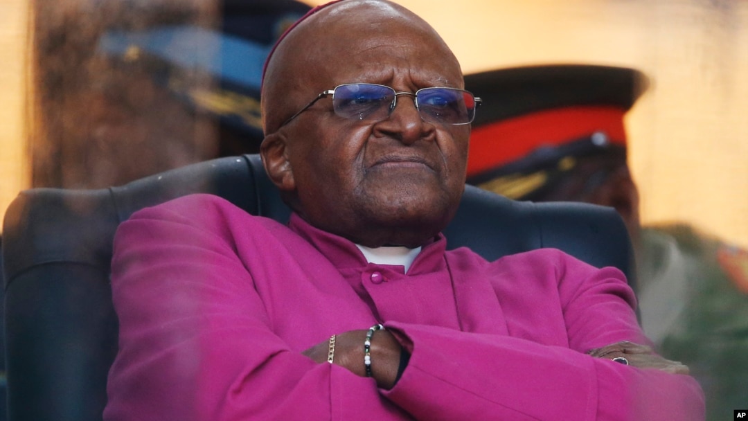 FILE - In this Dec. 10, 2013 photo, Retired Anglican Archbishop Desmond Tutu waits to speak during the memorial service for former South African president Nelson Mandela at the FNB Stadium in Soweto near Johannesburg.