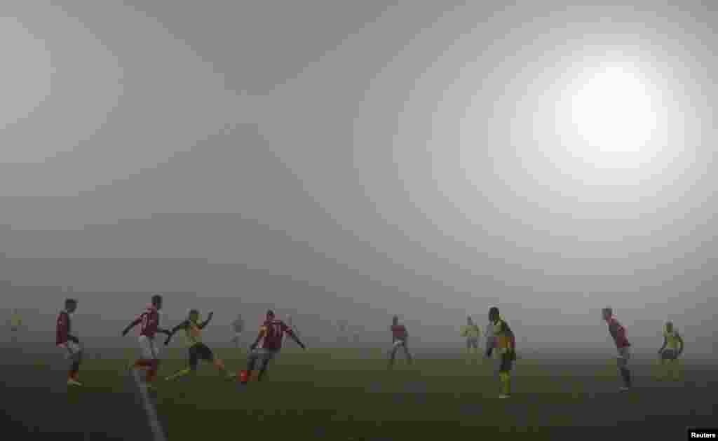 Soccer Football - Europa League - Group A - CSKA Sofia v Young Boys - Vasil Levski National Stadium, Sofia, Bulgaria - November 26, 2020 General view of an orange football in use during the match amongst the foggy weather conditions REUTERS/Stoyan Nenov