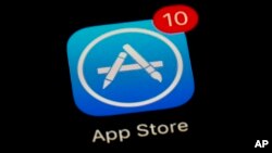 FILE - Apple's App Store app is seen on a smartphone in Baltimore, March 19, 2018.