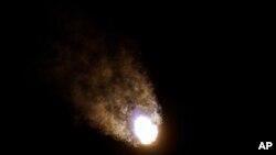 A SpaceX Falcon 9 rocket with the 25th batch of approximately 60 satellites for SpaceX's Starlink broadband network lifts off from the Space Launch Complex 40 at the Cape Canaveral Space Force Station in Cape Canaveral, Fla., late Wednesday, April 28, 202