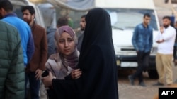 Palestinian women react after identifying a victim killed an Israeli strike on the Nuseirat refugee camp, in front of the al-Aqsa Martyrs hospital in Deir el-Balah in the central Gaza Strip, on Nov. 1, 2024.