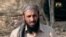 FILE - AQAP chief Nasir al-Wuhayshi allegedly addressing scores of jihadists at an undisclosed location in Yemen.