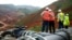 FILE - Employees stand in an open pit at Banro's Twangiza mine in eastern Congo.