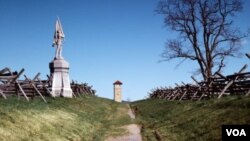 A Union flag-bearer’s statue and split-rail fence stand next to the sunken road that’s remembered as “Bloody Lane” at the Antietam Battlefield. (Carol M. Highsmith)