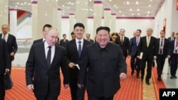 Лідер Північної Кореї Кім Чен Ин і президент Росії Володимир Путін у Пхеньяні. 20 червня 2024 року. Офіційне Корейське новинне агентство (KCNA).