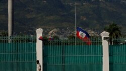 FILE - The Haitian flag flies at half-staff at the Presidential Palace in Port-au-Prince, Haiti, July 10, 2021, three days after President Jovenel Moise was assassinated in his home.