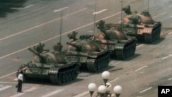 This photo of a man blocking a line of tanks in June 5, 1989 has become the iconic image of the Tiananmen Square protest.