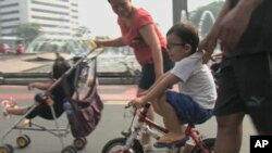 Most days the main thoroughfare in central Jakarta, Indonesia is noisy, polluted and congested with cars and motorcycles, but two Sundays a month, people-powered vehicles own the road