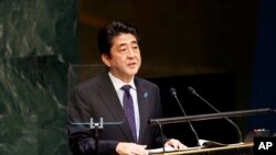 Perdana Menteri Jepang Shinzo Abe berpidato di Sidang Majelis Umum PBB (25/9). (AP Photo/Jason DeCrow)