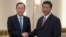 UN Secretary General Ban Ki-moon (L) shakes hands with Chinese President Xi Jinping at the Great Hall of the People in Beijing, June 19, 2013.