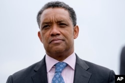 FILE - District of Columbia Attorney General Karl Racine, attends a news conference near the White House in Washington, Feb. 26, 2018.