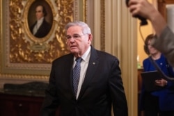 FILE - U.S. Senator Bob Menendez (D-NJ) exits the chamber at the U.S. Capitol building.