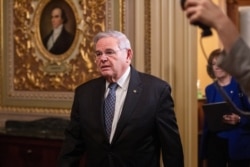 U.S. Senator Bob Menendez exits the chamber at the U.S. Capitol during U.S. President Donald Trump's Senate impeachment trial in Washington, Jan. 31, 2020.