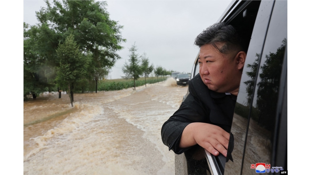 FILE - This picture taken July 28, 2024, and released by North Korea's official Korean Central News Agency via KNS shows leader Kim Jong Un surveying flood damage after record-breaking rains in Sinuiju, North Pyongan province.